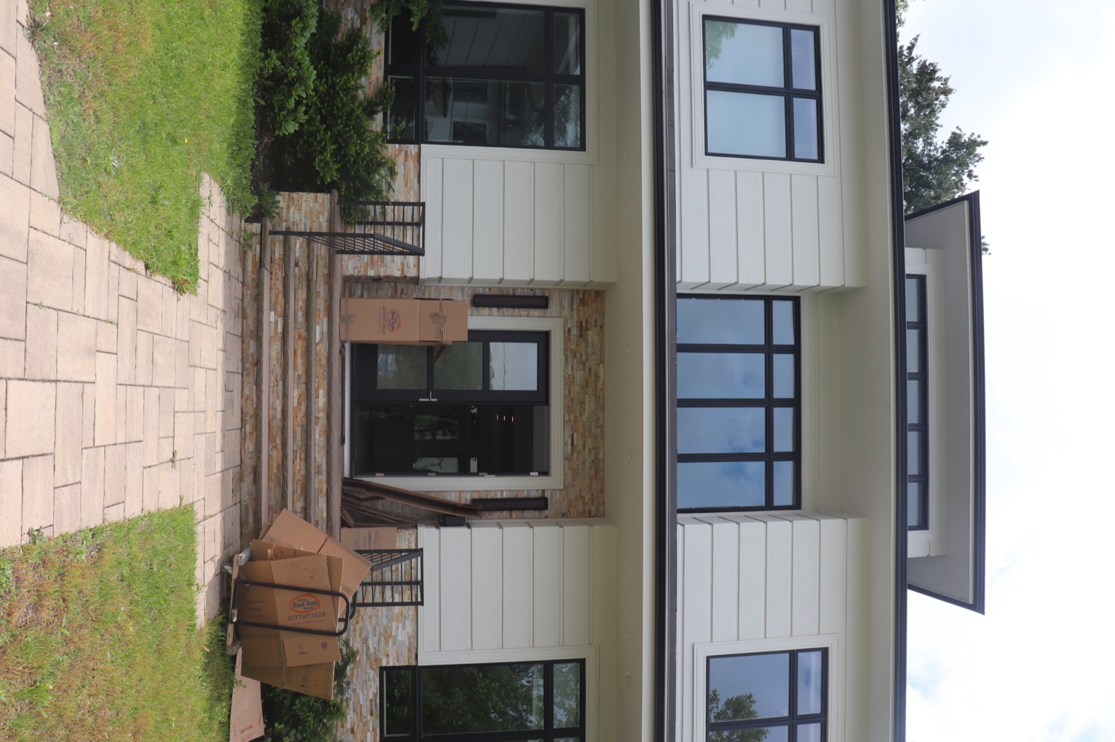 BBRM team carrying boxes at a residence