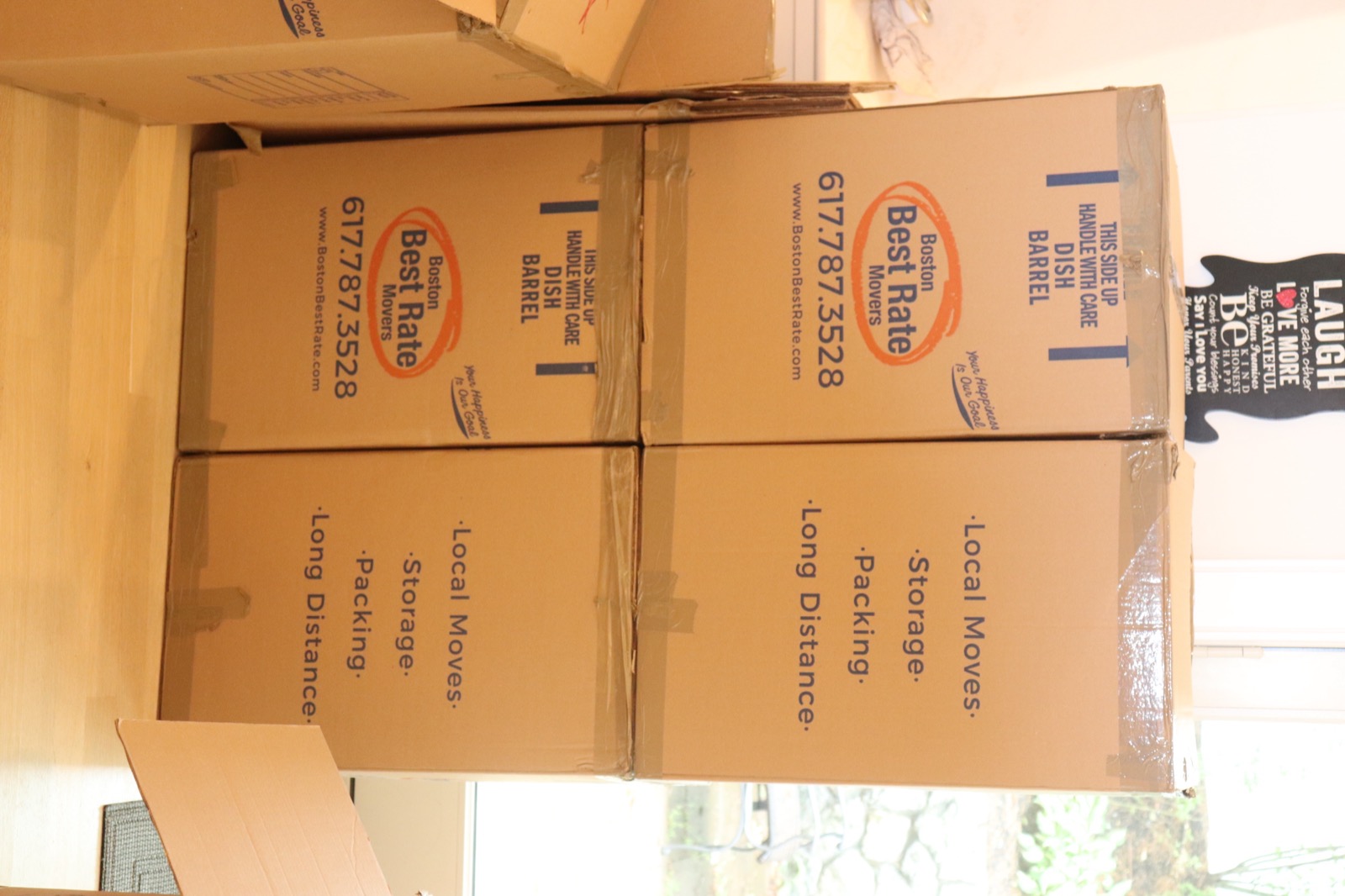 Boston Best Rate Movers handling large furniture