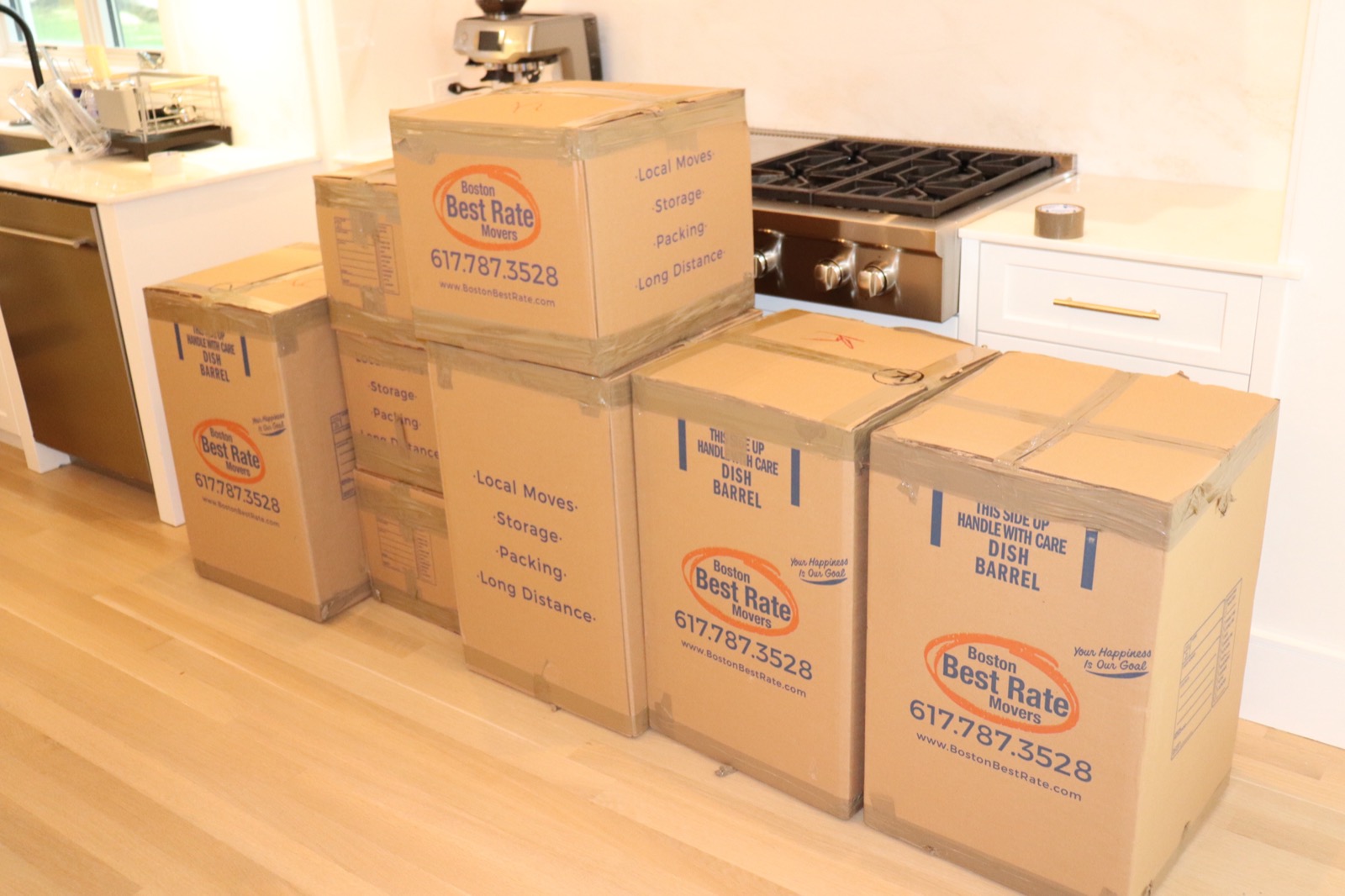 Boston Best Rate Movers loading a sofa