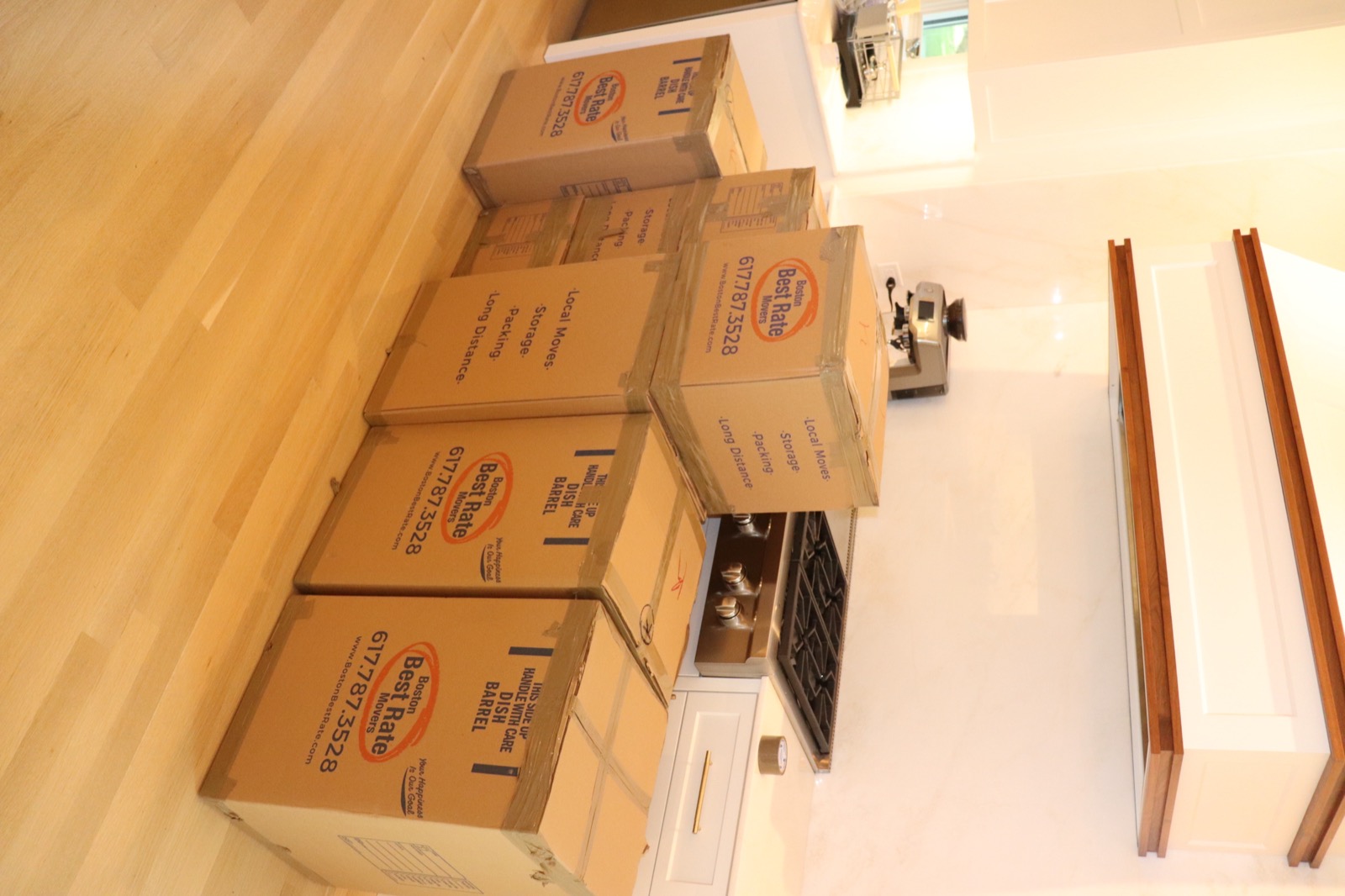 BBRM team navigating stairs with furniture