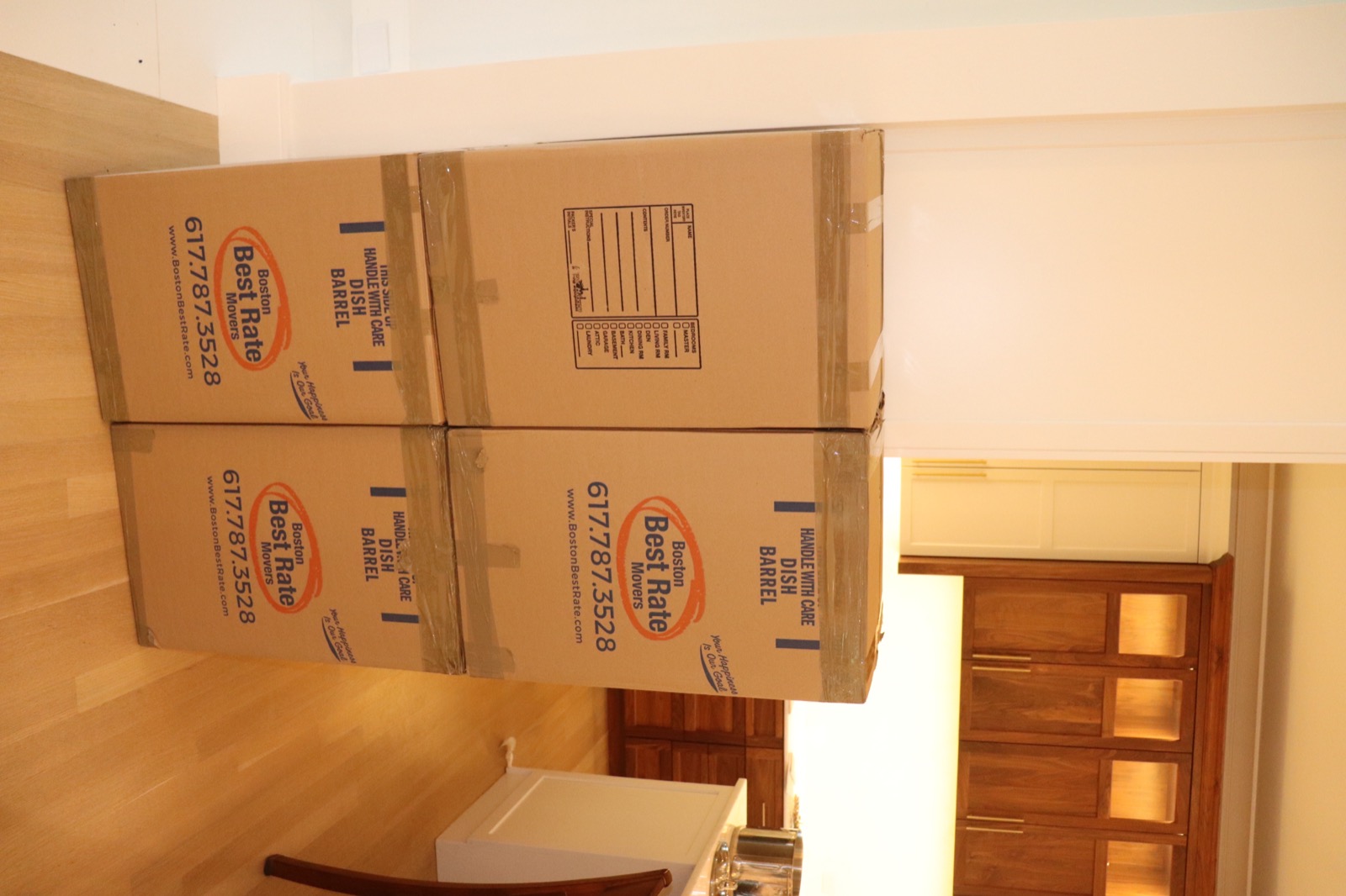 Moving boxes packed and labeled in a home
