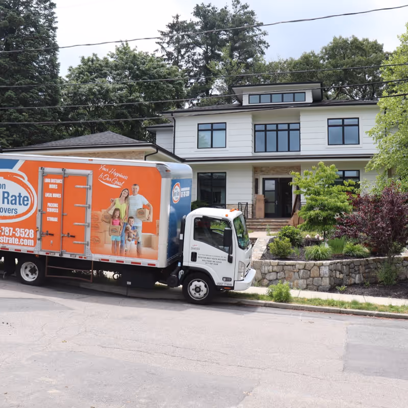 Boston Best Rate Movers truck at a residential home move