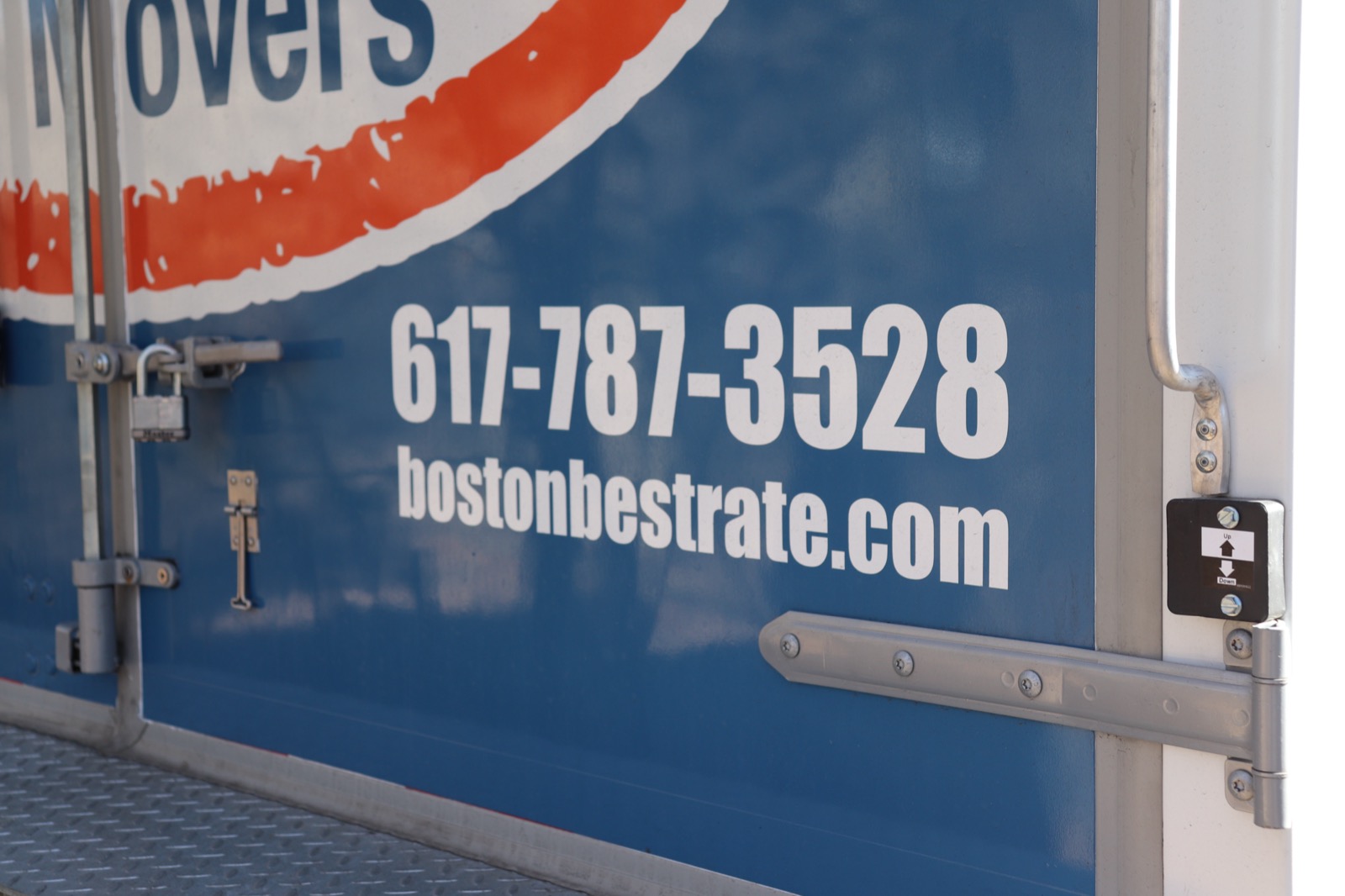 Boston Best Rate Movers truck parked at a residence