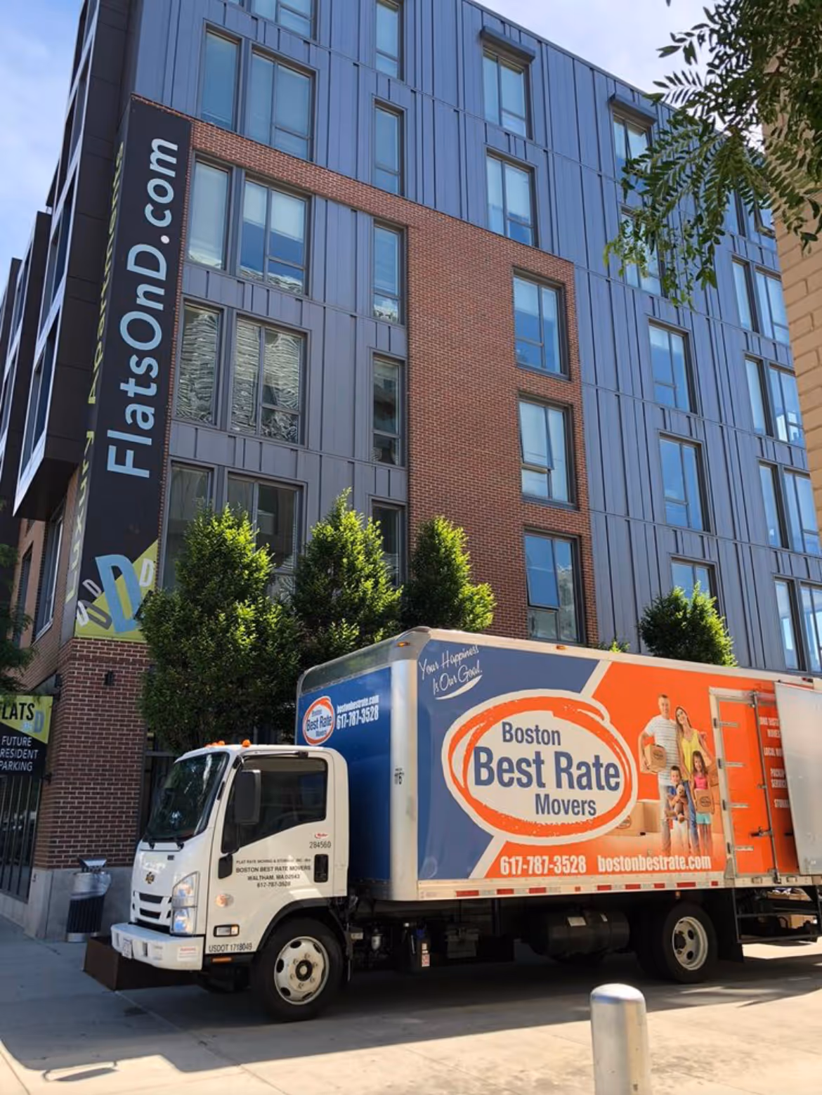 Boston Best Rate Movers truck at an apartment complex in Boston